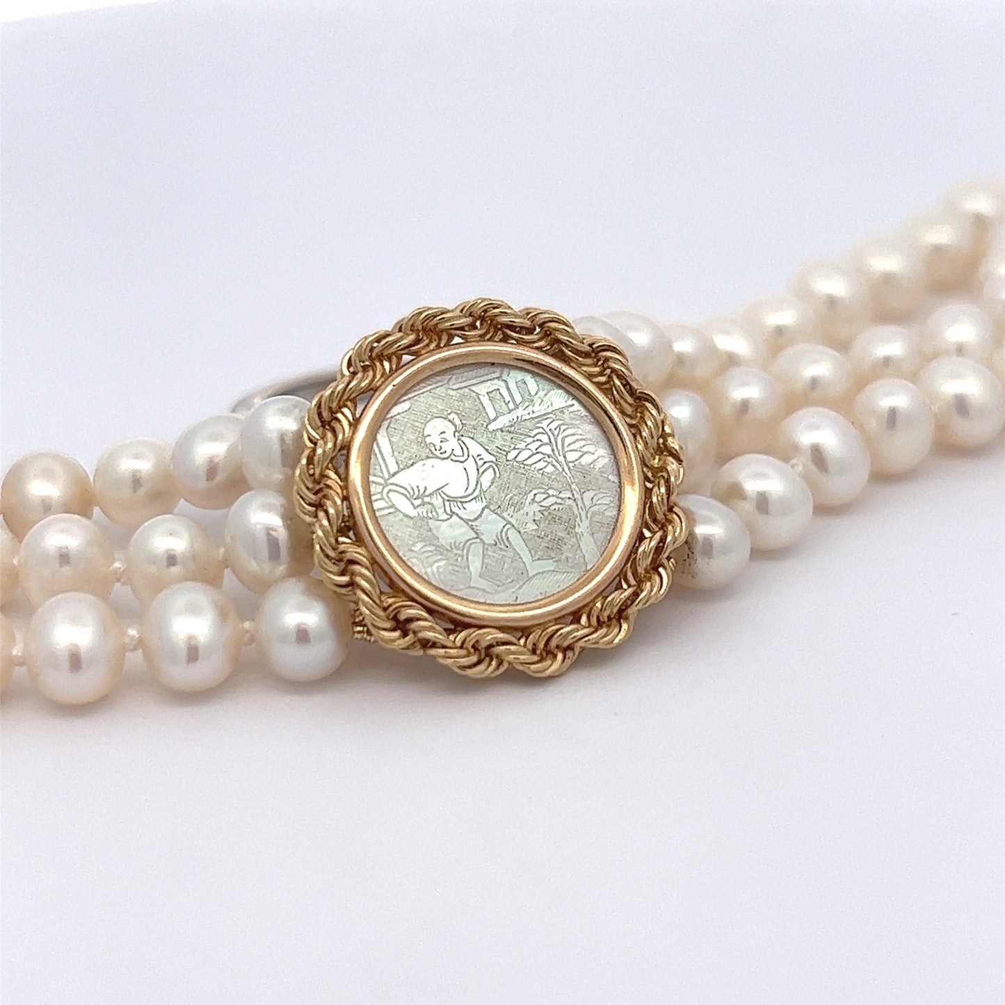 Triple Strand Pearl Bracelet with Round Gambling Counter