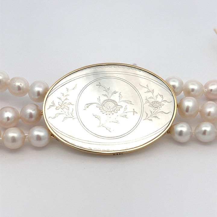 Triple Strand Pearl Bracelet with Oval Counter