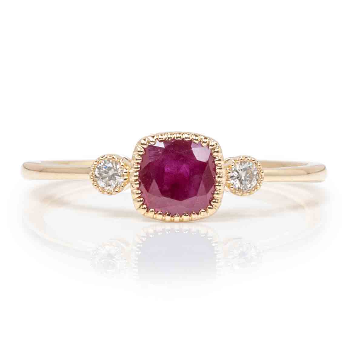 Cushion Ruby with Round Diamonds Bezel Set Ring